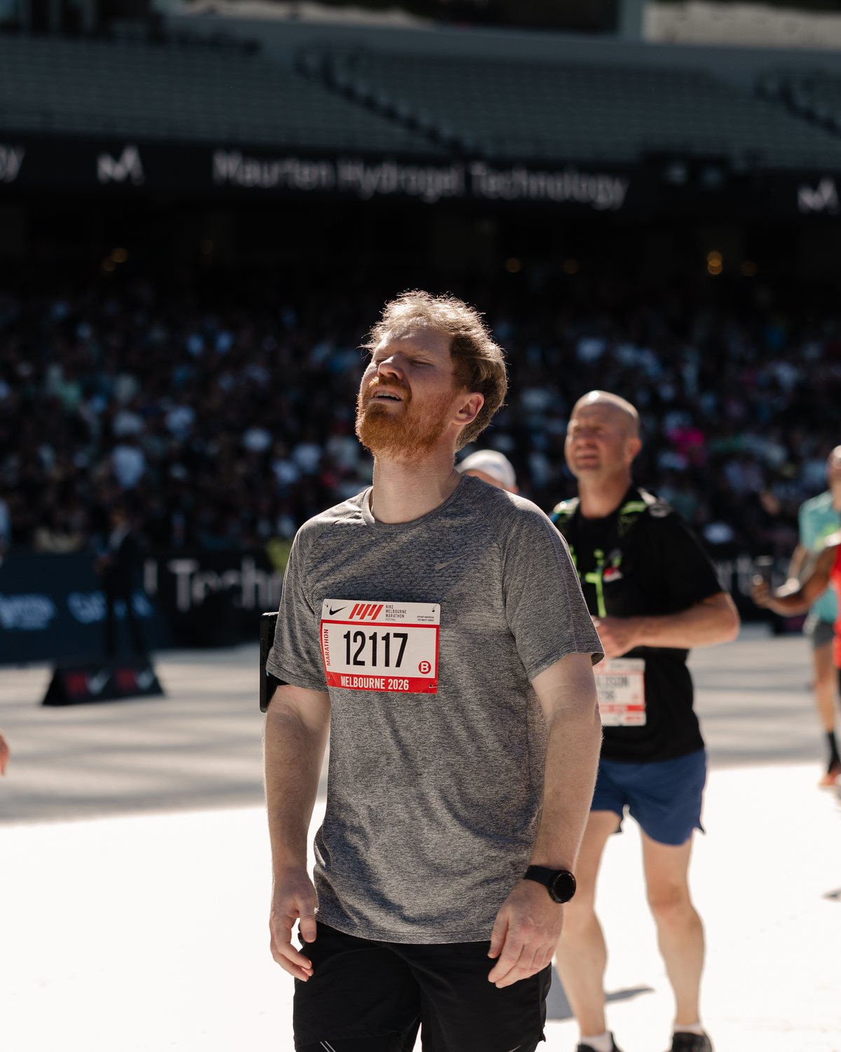 Melbourne Marathon, a runner looking skyward, drained